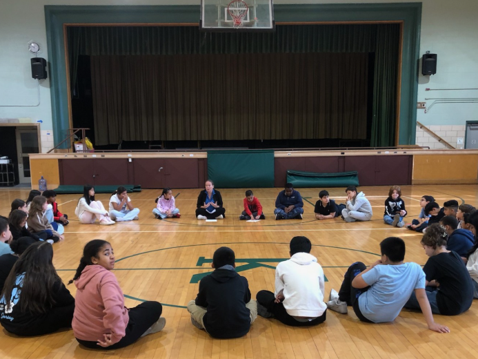 kids in the gym in a circle